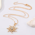 Gold Tone Crystal Snowflake Sunburst Pendant Necklace view 3