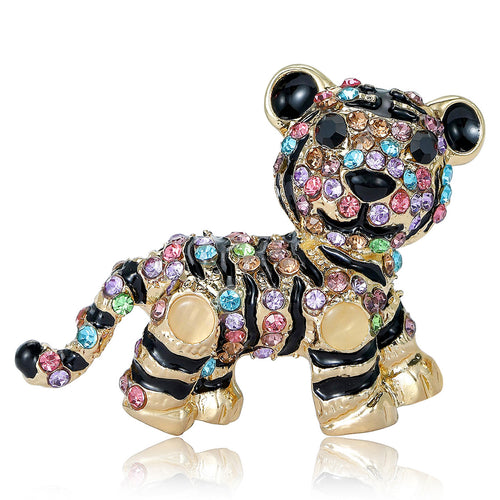 Gold multicolor rhinestone tiger cub brooch standing on white