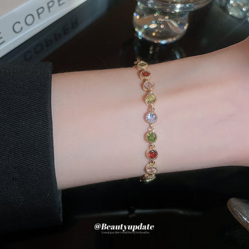 Gold Tone Bracelet With Red Green Pink And Clear Round Crystals