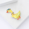 Bright Yellow Duck Brooch with Blue Hat and Orange Feet view 4