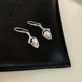 Silver Tone Flower Outline Pearl Look Hook Earrings view 4