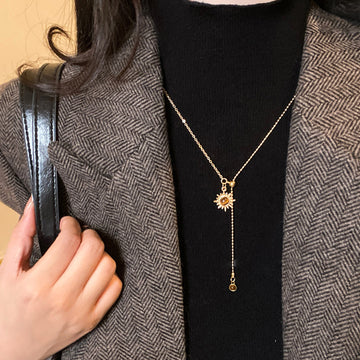 Gold Tone Sun Pendant Necklace with Fine Chain Drop