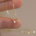 Gold Tone Double Heart Bow Clear Stone Pendant Necklace view 2