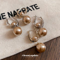 Champagne Faux Pearl Drop Hoop Earrings in Two Metal Tones view 2