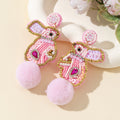 Pink Seed Bead Bunny Rabbit Earrings With Fluffy Pom Pom Tail view 2