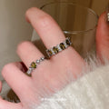 Two Silver Tone Green Link And Oval Crystal Open Ring Designs view 1