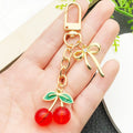 Transparent or Solid Red Cherry Bow Clasp Keychains view 4