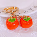 Persimmon and Orange Fortune Charm Keychains in Eighteen Pictured Designs view 2