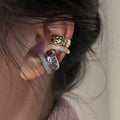 Layered Sculptural Ear Cuffs in Gold and Silver Tones view 2