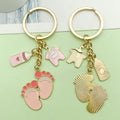 Baby Shower Charm Keychains Featuring Pink Outfit Set Across 14 Pictured Variations view 2