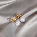 Gold Tone Bow Pearl Look Dangle Stud and Clip Earrings view 6