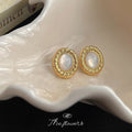 Gold Oval Shell Stud Earrings Twisted Rope Frame Border view 4