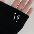 Silver Tone Organic Wavy Mismatched Stud Earrings With Metal Details view 6