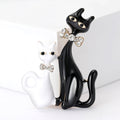 Two Cat Enamel Brooch with Polished Metal and Decorative Accents view 2