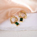 Gold Tone Open Loop Earrings With Deep Blue Rectangle Drops view 3