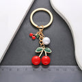Six-Style Red and Black Cherry Pearl Charm Keychain Collection view 4