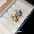 Gold Open Bear Ring With Pearl and Star Crystal Ends view 4