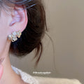 Silver Crystal Ribbon Bow Stud Earrings with Sculpted Loops view 4