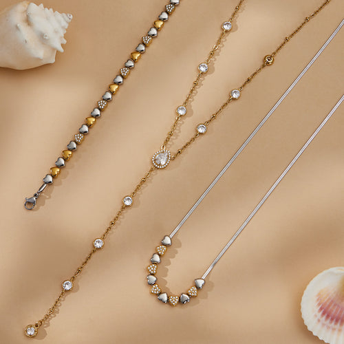 Coordinated set view of crystal heart bracelet and necklaces in main image 1.