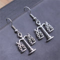 Balance Scale Dangle Earrings in Silver and Bronze Tones view 1