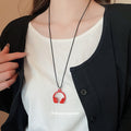Mini Headphone Pendant Necklace on Adjustable Black Cord view 3