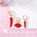 Gold Tone Red Enamel Chili Pepper and Lips Huggie Earring Set view 3