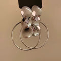 Silver Tone Disc and Wire Circle Statement Earrings view 2