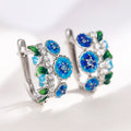 Silver Tone Blue Flower Green Leaf Huggie Earrings view 2