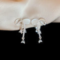 Crystal Bow Short Dangle Clip On Earrings With Polished Metal Details view 6