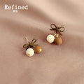 Olive Bow Stud Cream and Brown Ball Cherry Drop Earrings view 3
