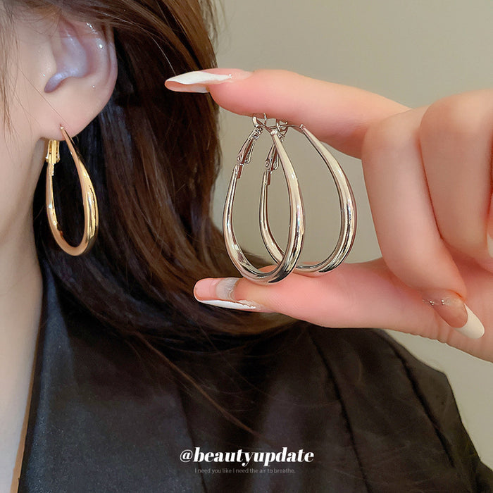 Slim Oval Statement Hoop Earrings in Gold and Silver Tones