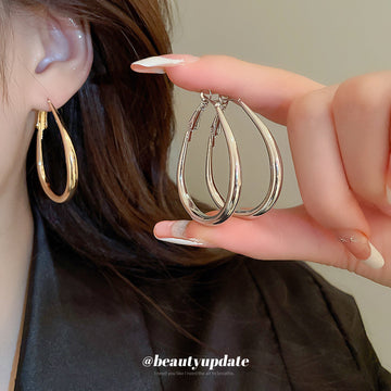 Slim Oval Statement Hoop Earrings in Gold and Silver Tones
