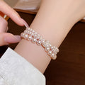 Pink Triple Strand Faux Pearl Bracelet Crystal Barrel view 1