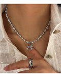 Rocking Horse Pendant Pearl Necklace In Gray And White view 6