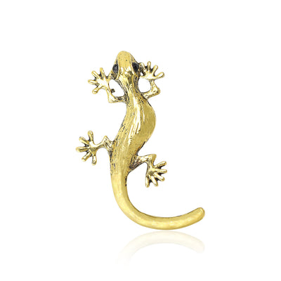 Front view of the textured metal gecko brooch with curved tail decorative clothing pin on a white background