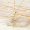 Gold Tone Crystal Lightning Bolt Pendant Necklace with Fine Chain view 1