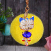 Royal-Blue-Cat Yellow-Pom