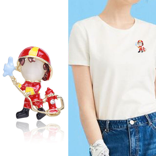 Blue firefighter brooch on white display