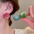 Glossy Round Stud Earrings in Pink Blue and Green Color Options view 2
