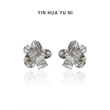 Silver Ribbed Flower Stud Earrings with Clear Crystal Center