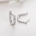 Silver Tone U Shaped Huggie Earrings With Three Clear Stones view 3