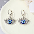 Crystal Lash Blue Evil Eye Huggie Earrings in Gold and Silver Tone view 3
