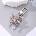 Silver Tone Crystal Winged Fairy Clip Keychains in Five Colors view 7