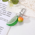 Silver Tone Citrus Slice and Fruit Novelty Clip Keychains view 2