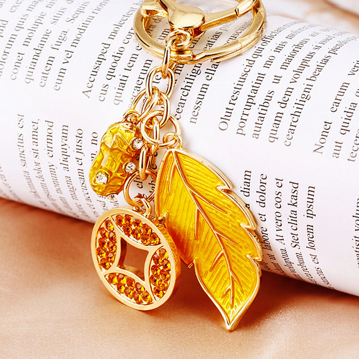 Yellow Leaf and Coin Charm Keychains with Fifteen Braided Strap Options