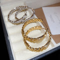 Crystal Textured Hoop Earrings In Silver And Gold Tones view 4