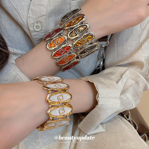 Oval Enamel Stretch Bracelets With Greek Key Motif