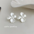 White Painted Flower And High Luster Pearl Stud Earrings view 4