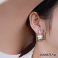 Gold Triple Clear Stone White Pearl Huggie Ear Clips view 4
