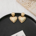 Ribbed Heart Gold and Silver Statement Stud Earrings view 2